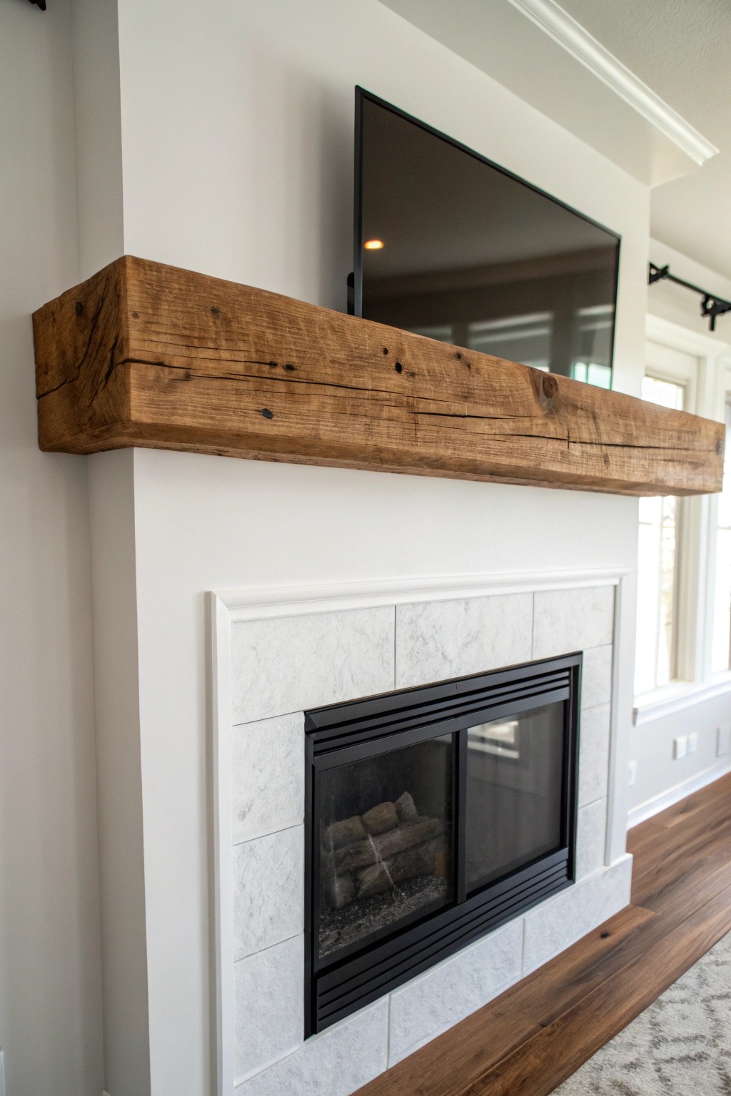 Elevate your space with the simple beauty of a reclaimed wood floating mantel.