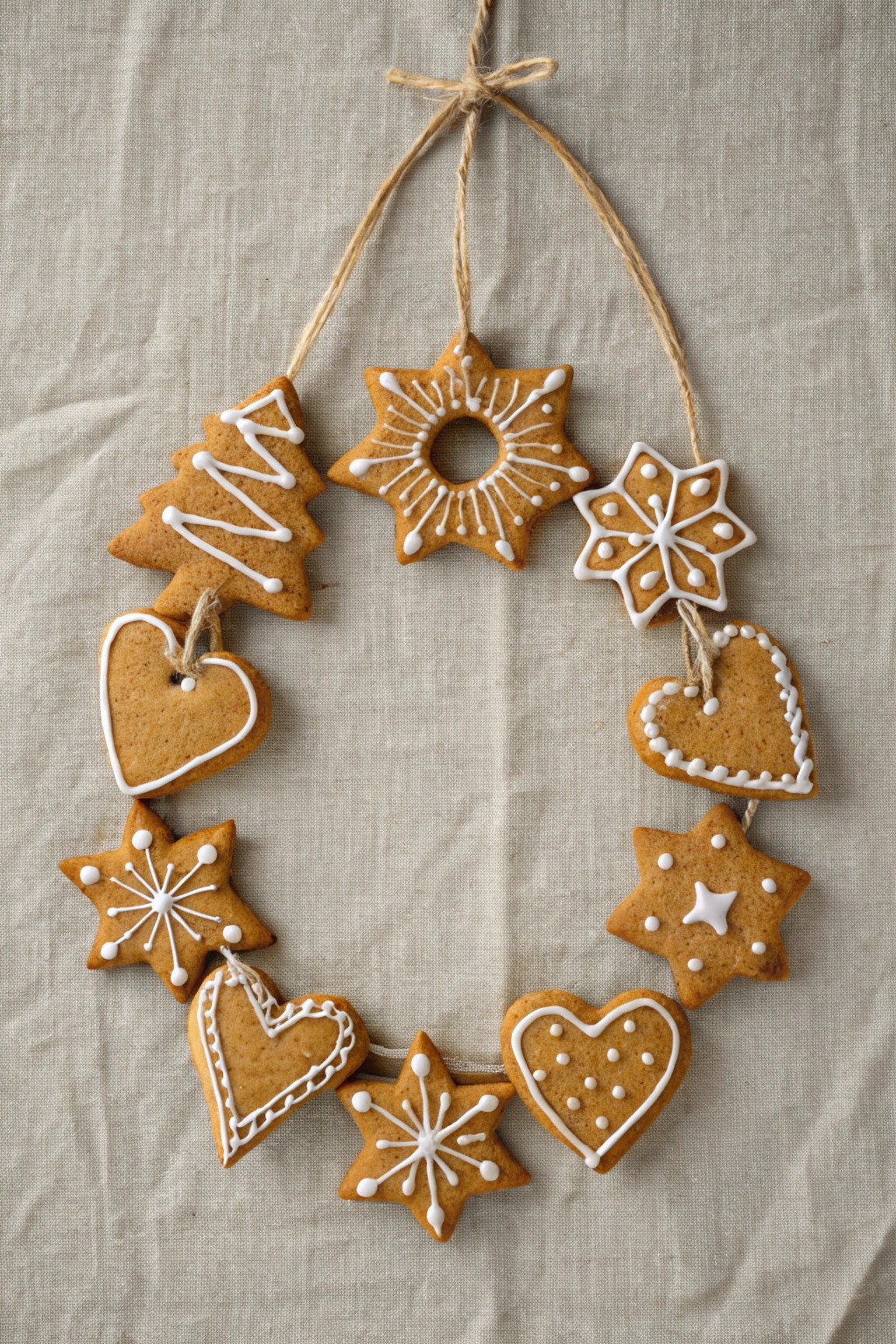 Whimsical gingerbread cookie wreath—handcrafted holiday charm for your home.