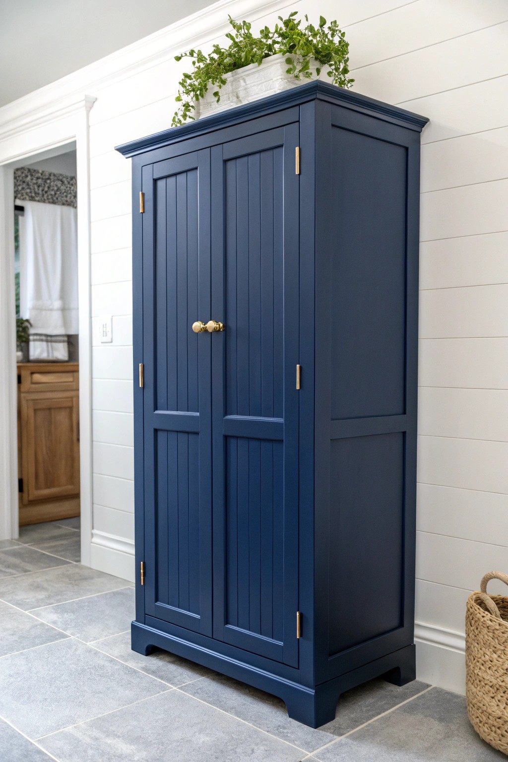 Make your laundry room pop with a bold, beautifully crafted cabinet in rich navy blue.