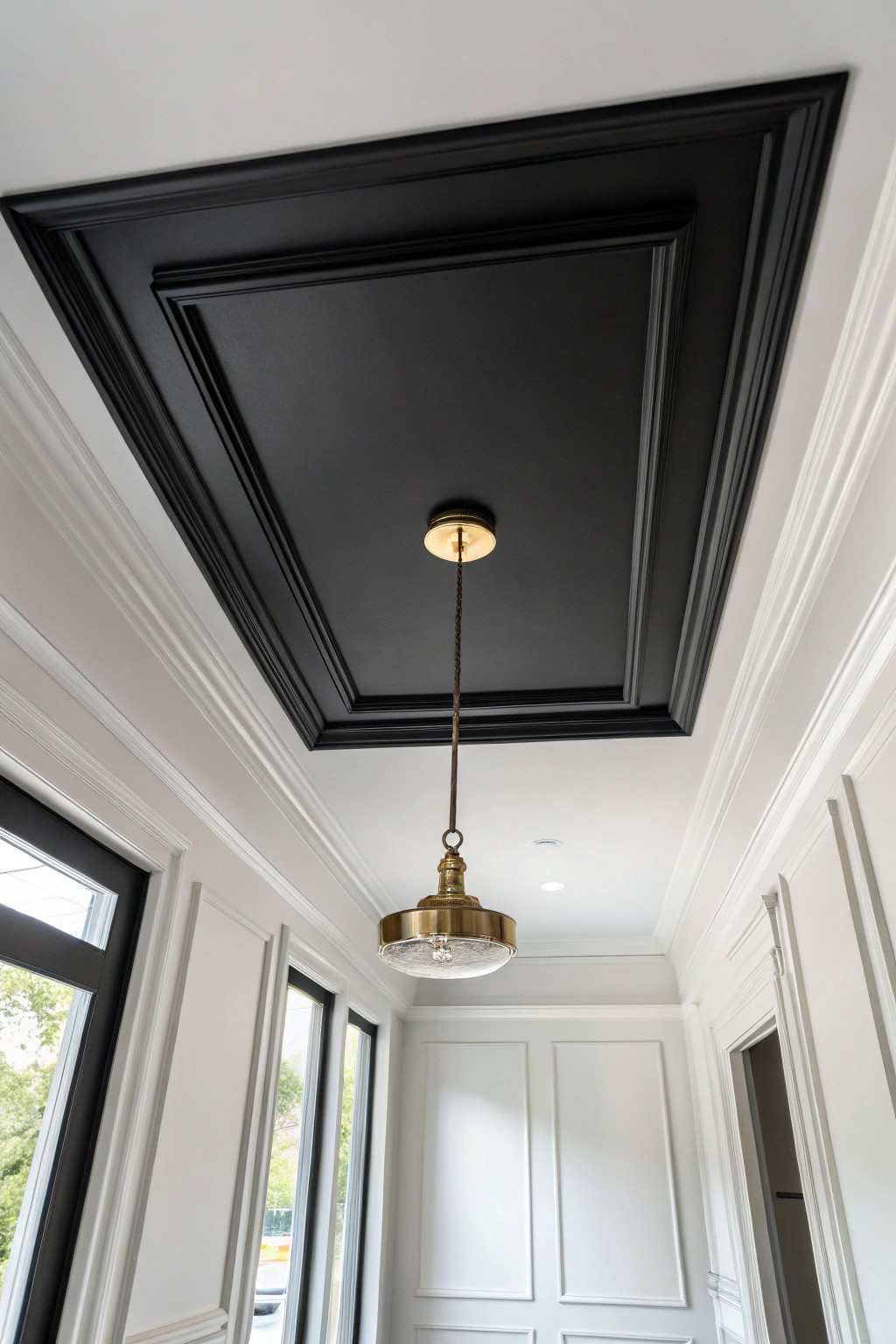 Dare to go bold—a black ceiling transforms any space with cozy drama and timeless style.