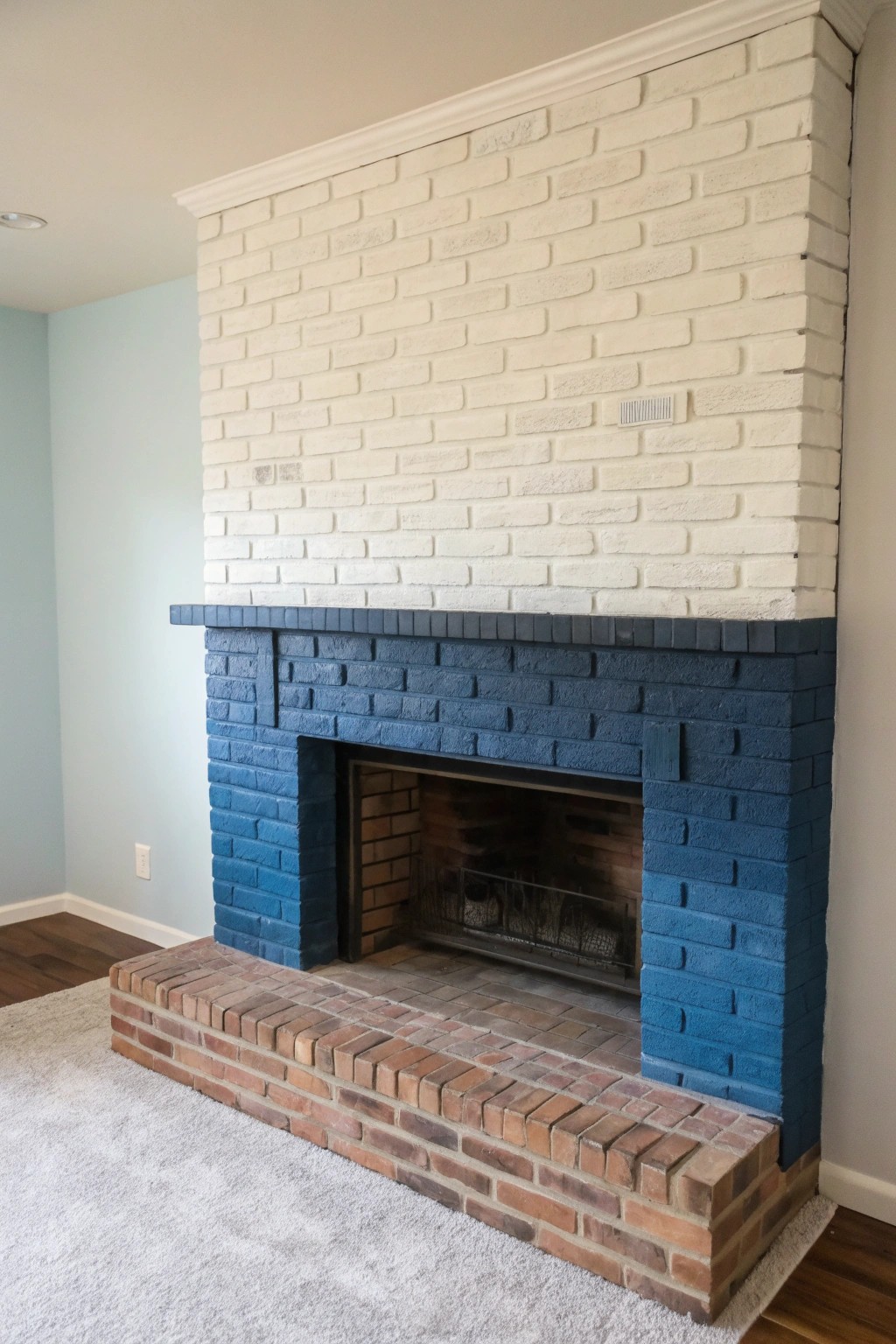 Elevate your space with an ombre-painted brick fireplace—where art meets craftsmanship.