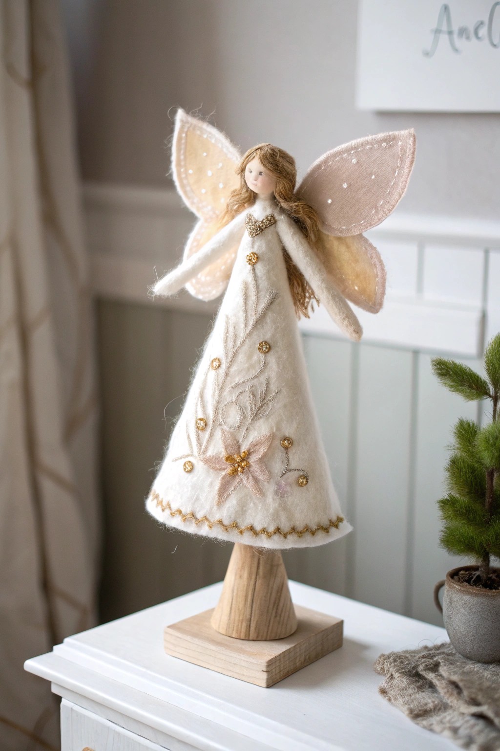 A magical felted fairy tree topper—minimalist, elegant, and crafted with heart.