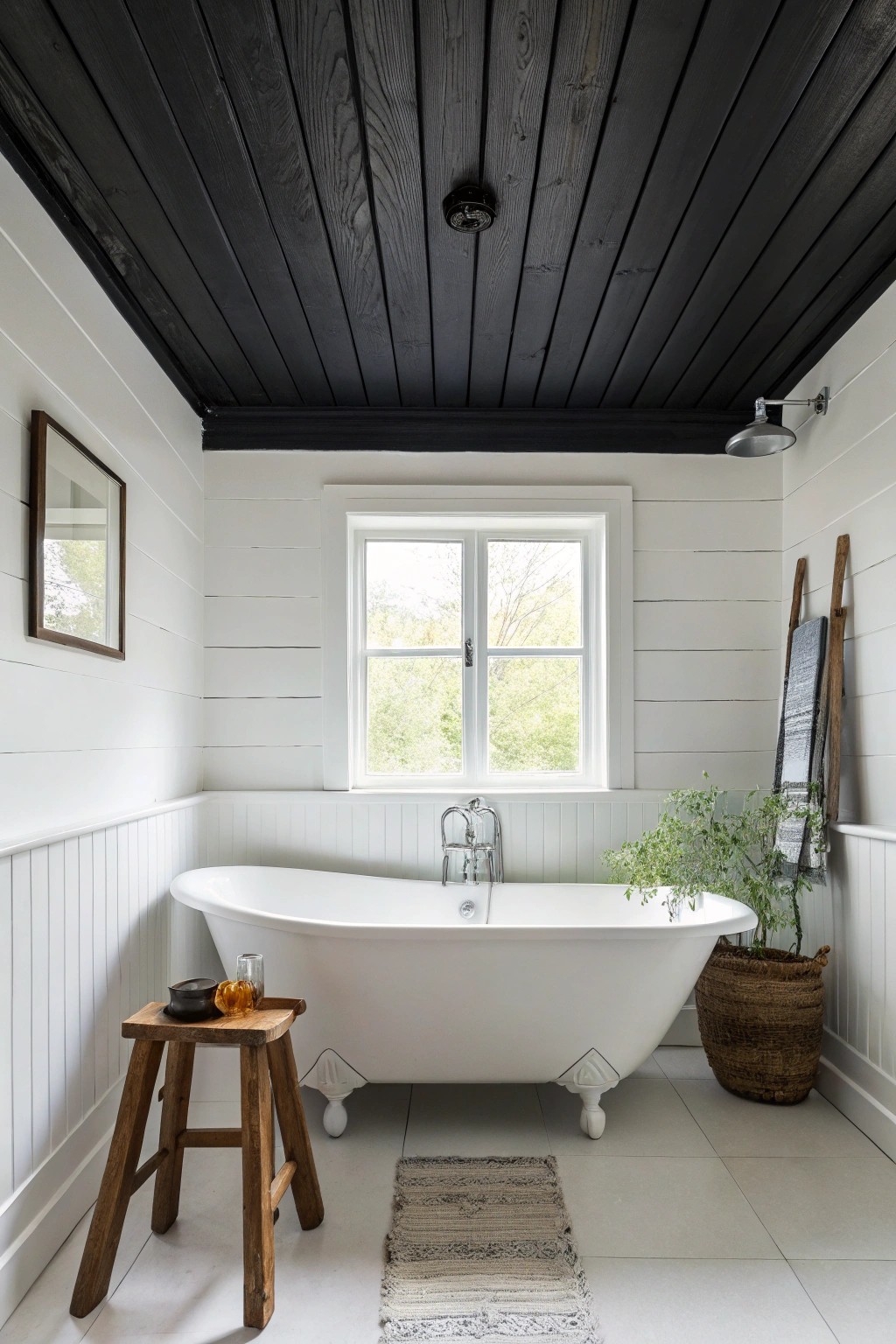 Elevate your bathroom with a bold black ceiling—where simplicity meets striking style.