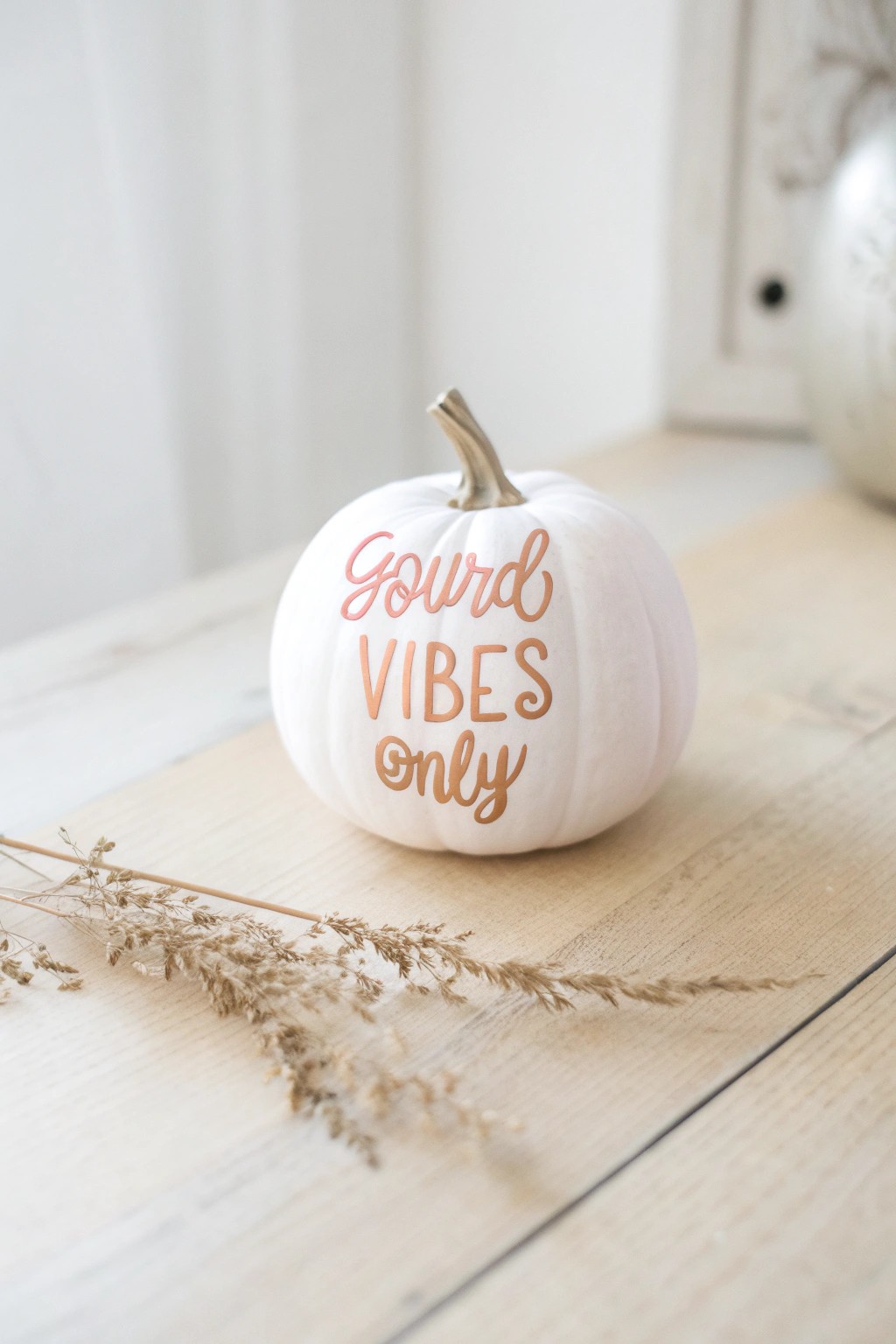 Spread ‘gourd vibes only’ with a hand-lettered mini pumpkin—simple, chic, and a perfect conversation starter!