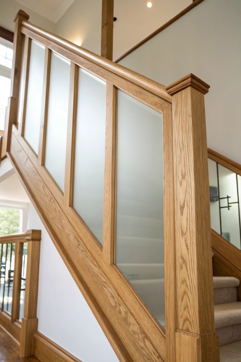 Elegant privacy: a frosted glass stair railing that blends beauty and seclusion.