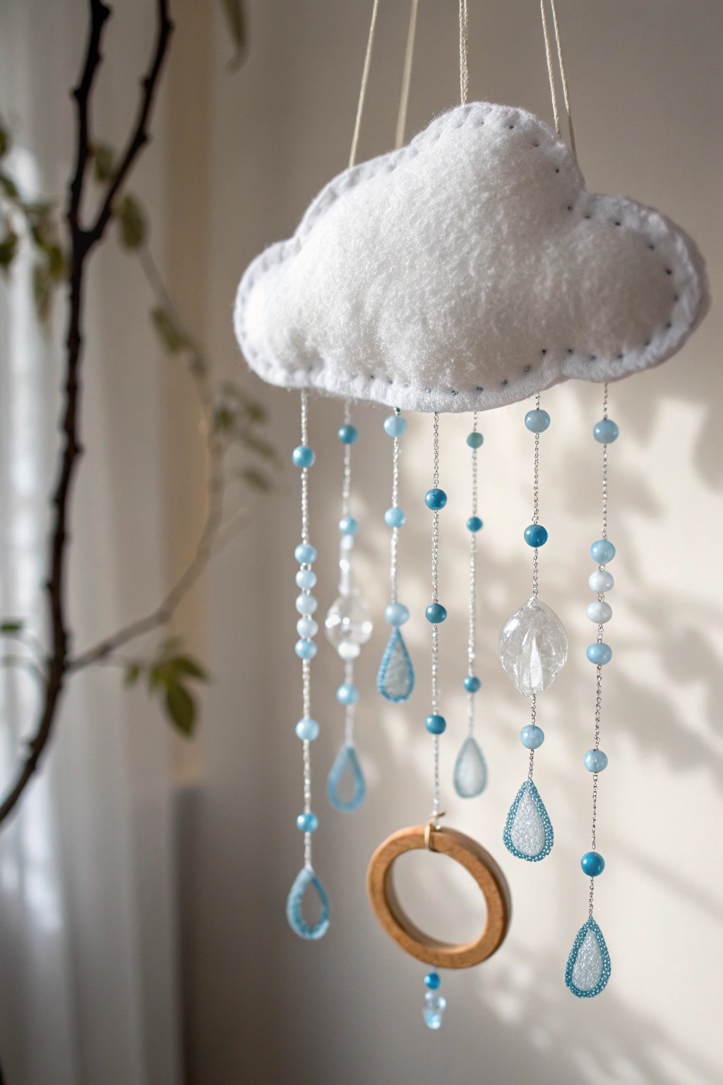 Bring a touch of spring magic indoors with a handcrafted rain cloud mobile—simple, whimsical, and beautifully made.