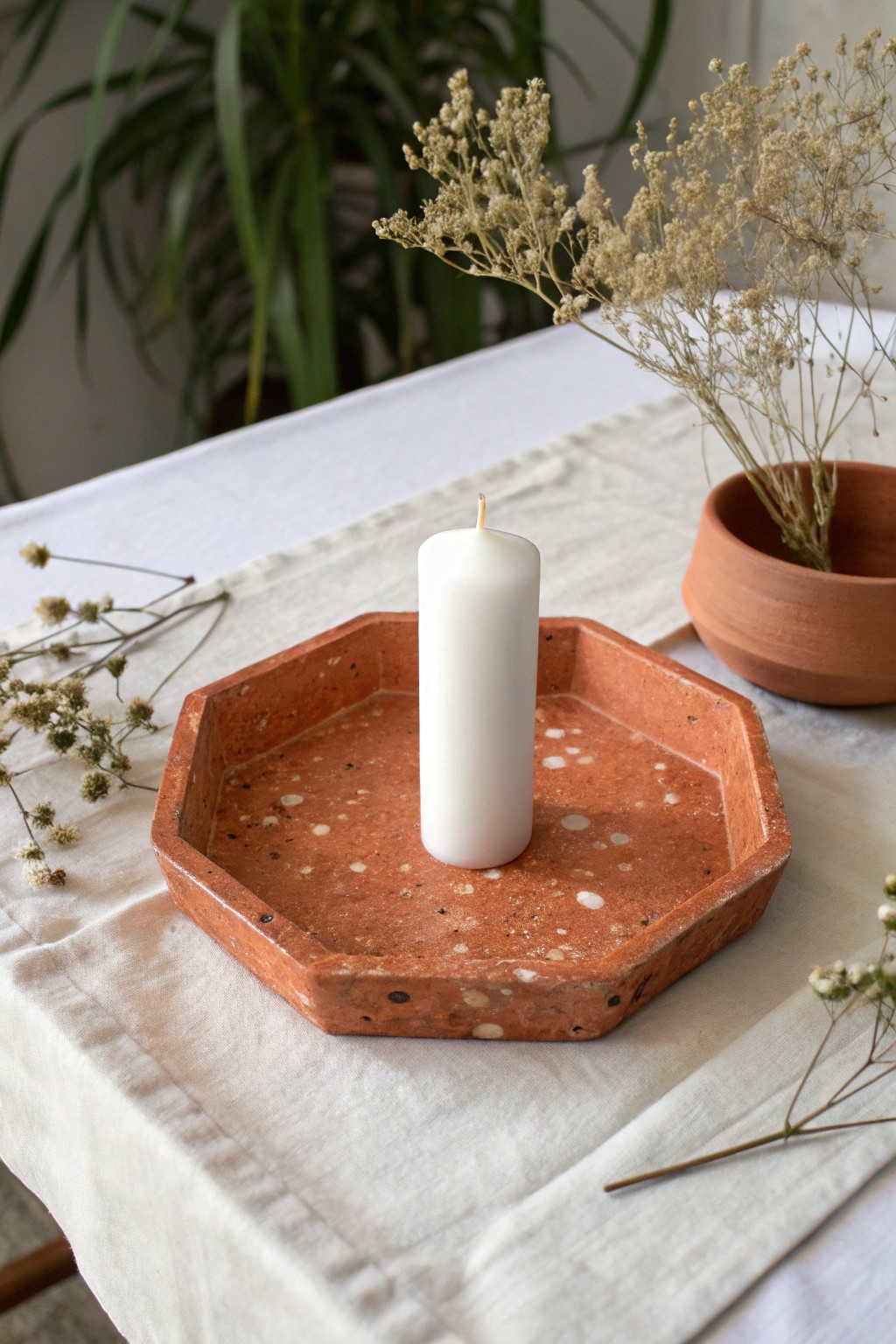 Bold geometry meets handcrafted beauty—elevate your table with a stunning clay candle plate.