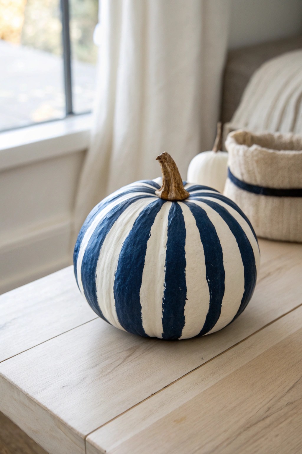 Bold stripes, Scandinavian style: a mini pumpkin makeover with graphic flair.