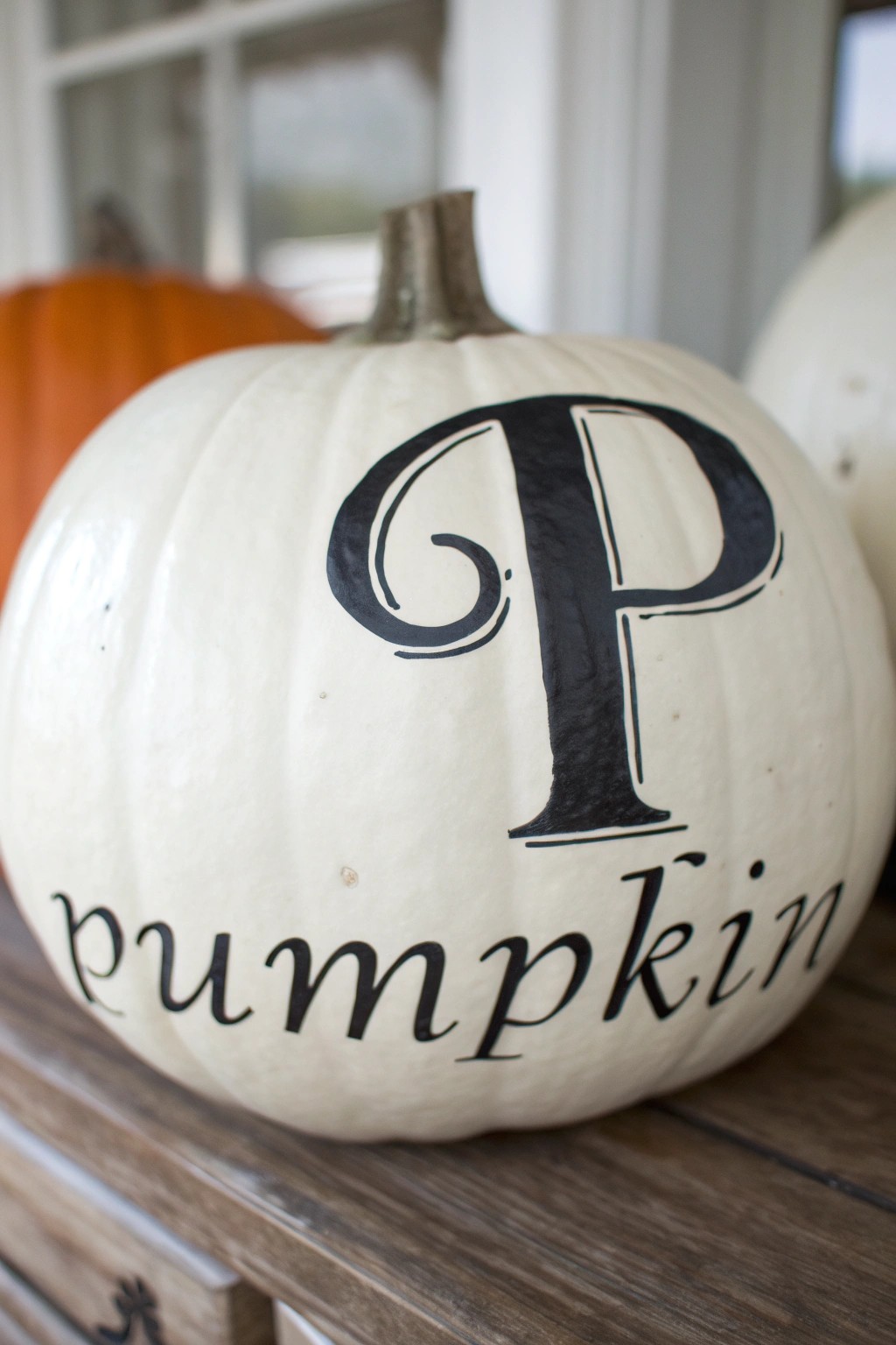 Elevate your entryway with a handcrafted monogrammed pumpkin—simple, personal, and effortlessly chic.