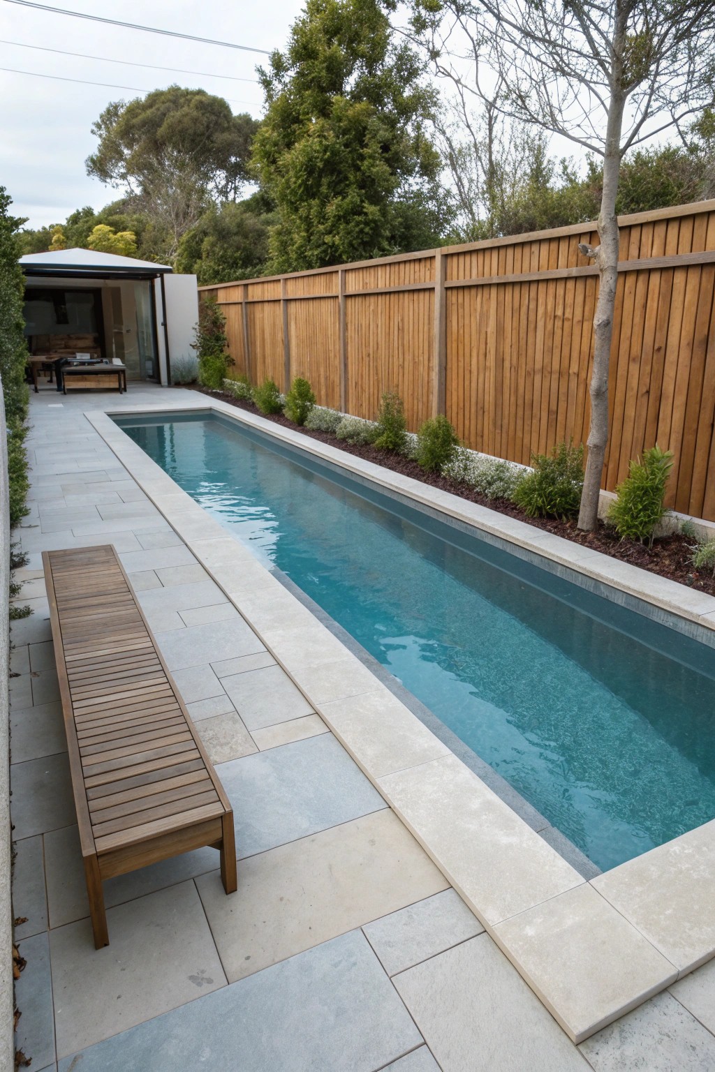 Sleek lap pool perfection—minimalist design meets morning swim motivation.