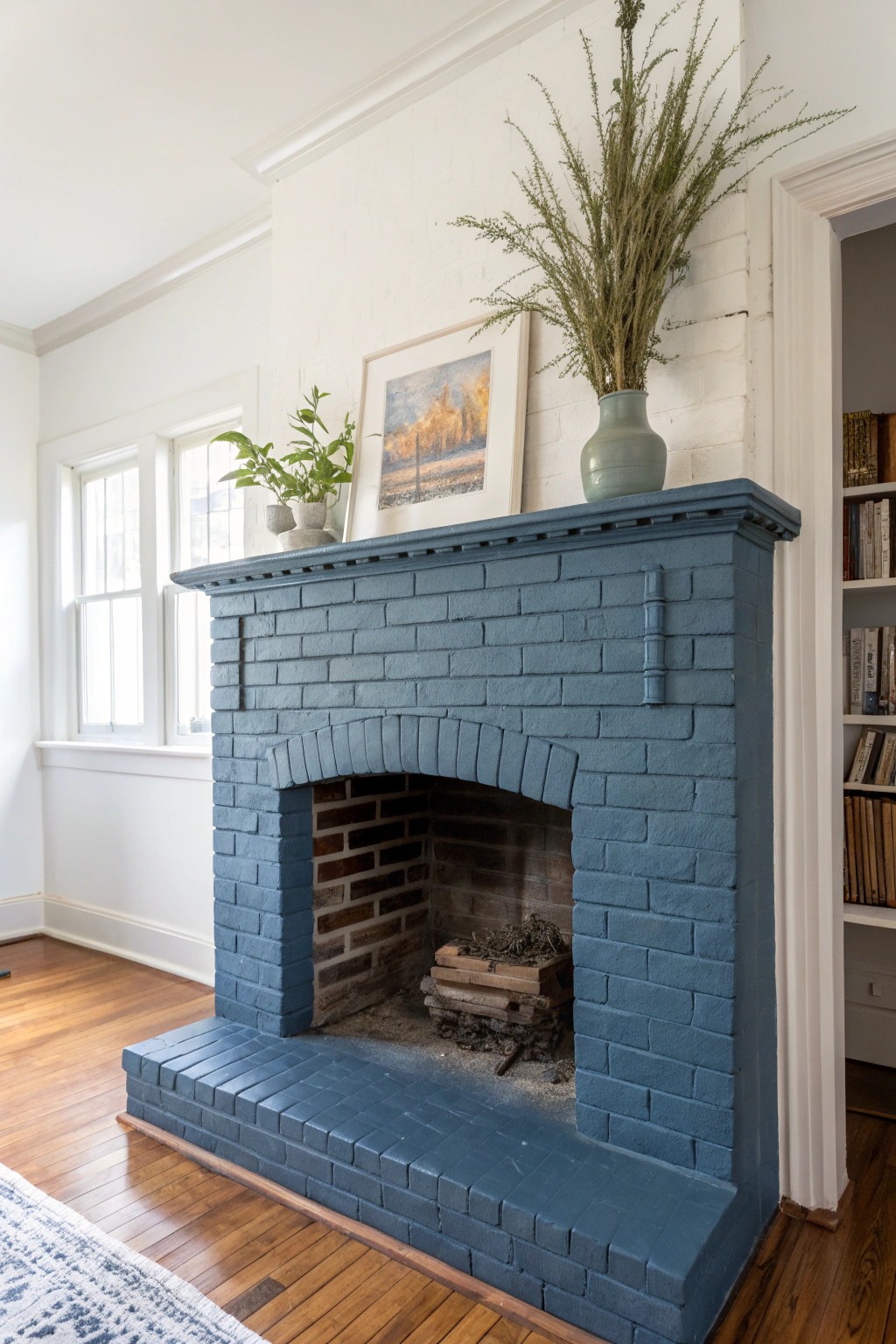 A slate blue brick fireplace adds a fresh, artistic touch to any simple and natural living space.