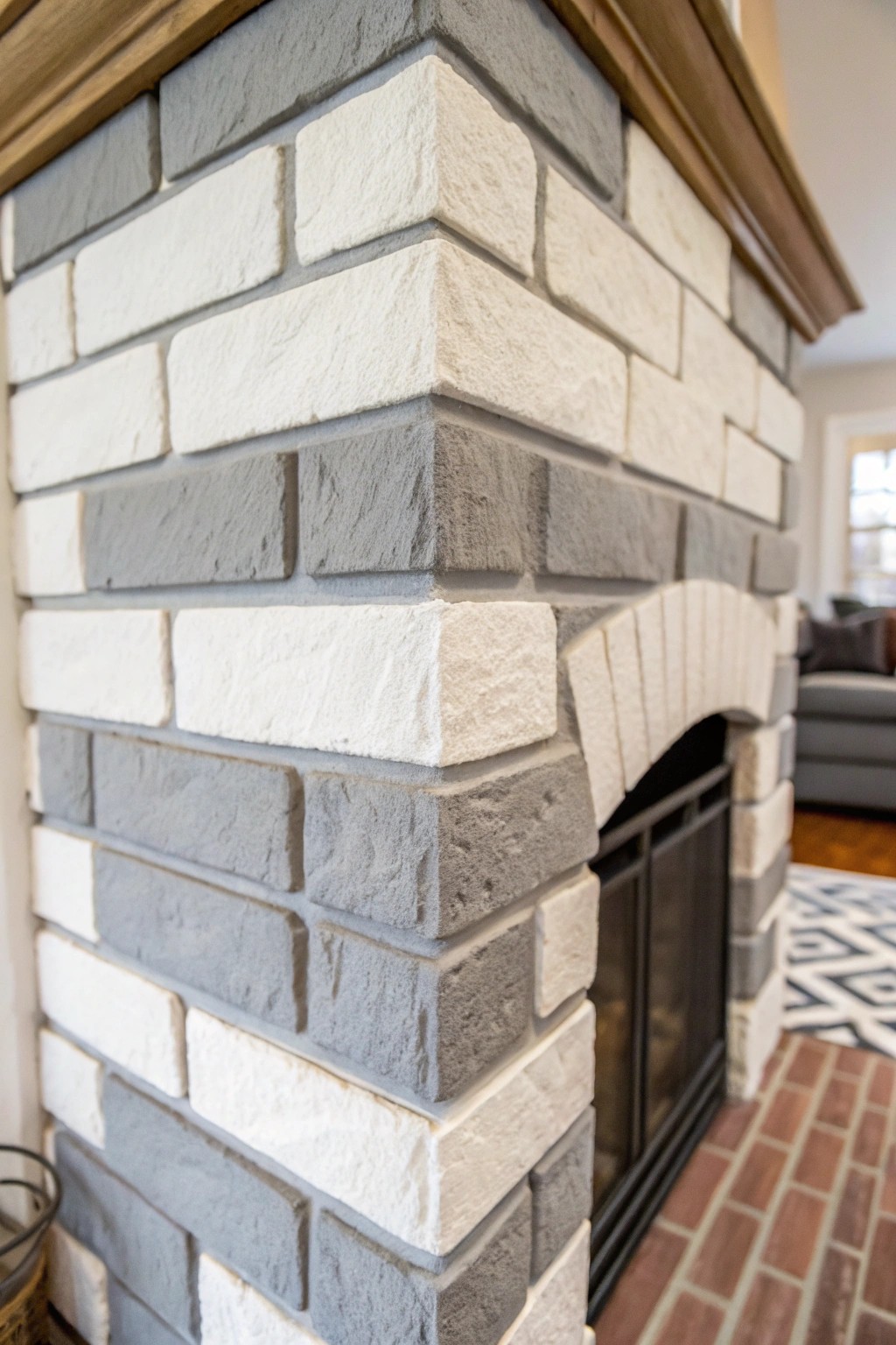 Elevate your fireplace with a simple two-tone painted brick design for effortless artistic flair.