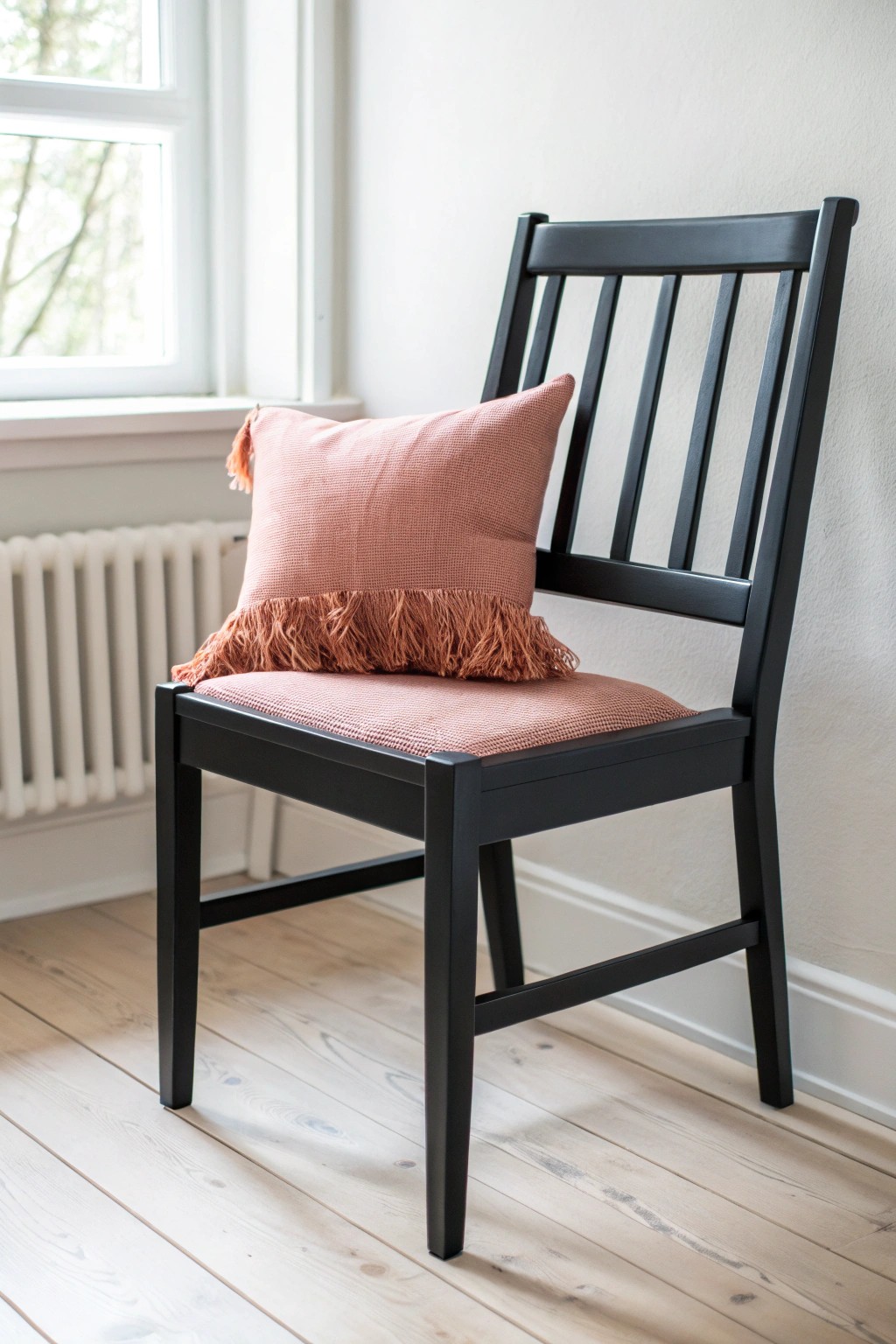 Transform your space with a bold black accent chair—where Scandinavian simplicity meets boho charm.