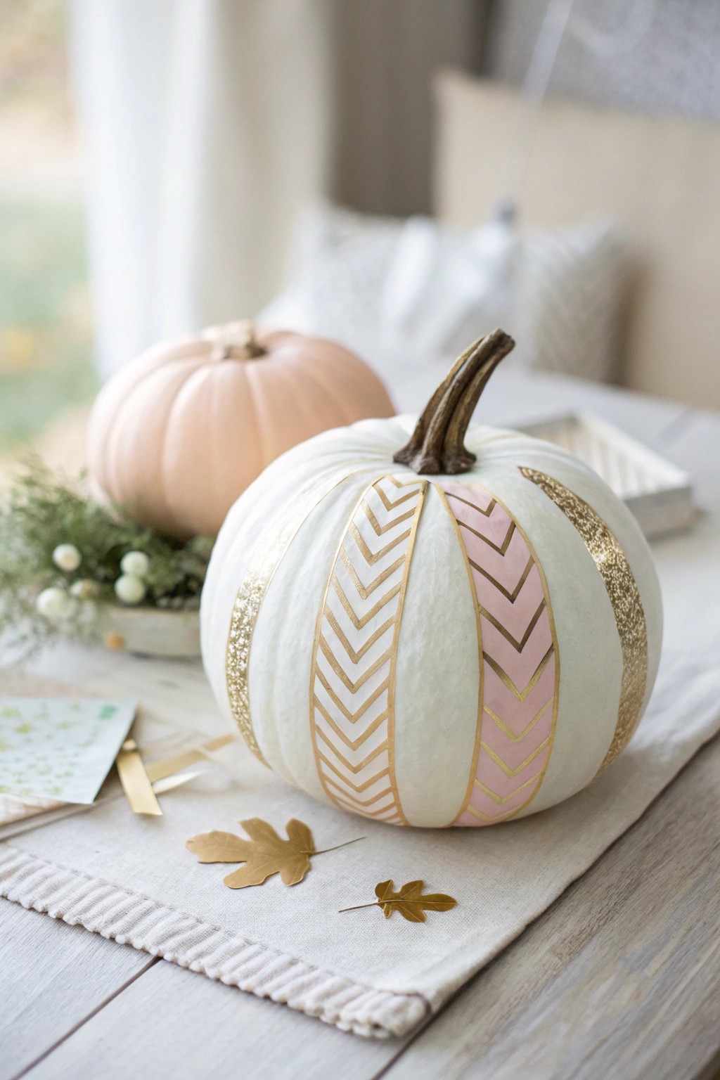 Chic and modern: A washi tape-adorned pumpkin for effortless autumn style.