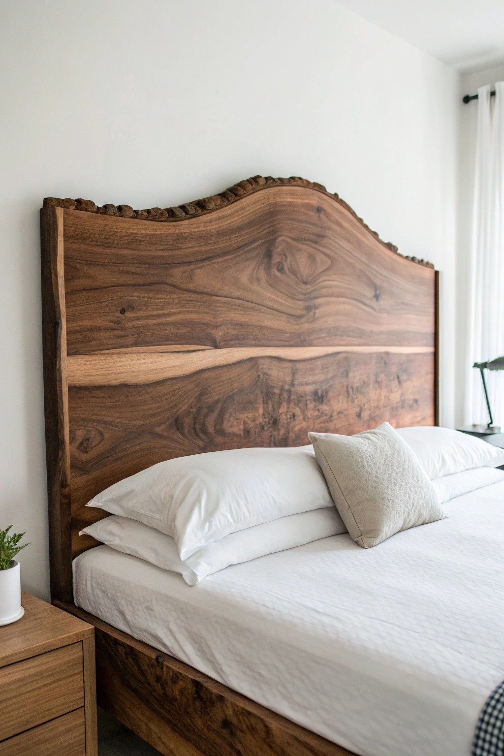 Raw beauty: A handcrafted live edge wood headboard transforms any bedroom into a natural sanctuary.