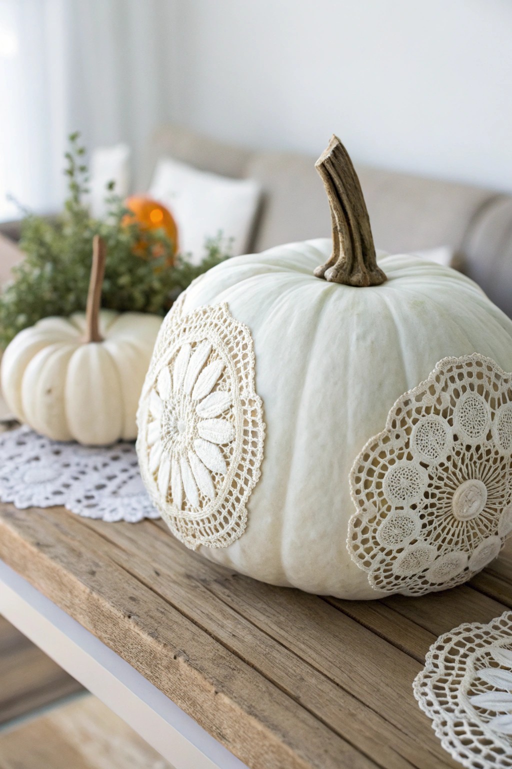 A boho-chic pumpkin: vintage doilies meet minimalist Scandinavian style.